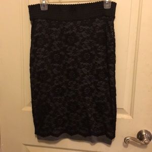 Pencil skirt with black lace overlay.